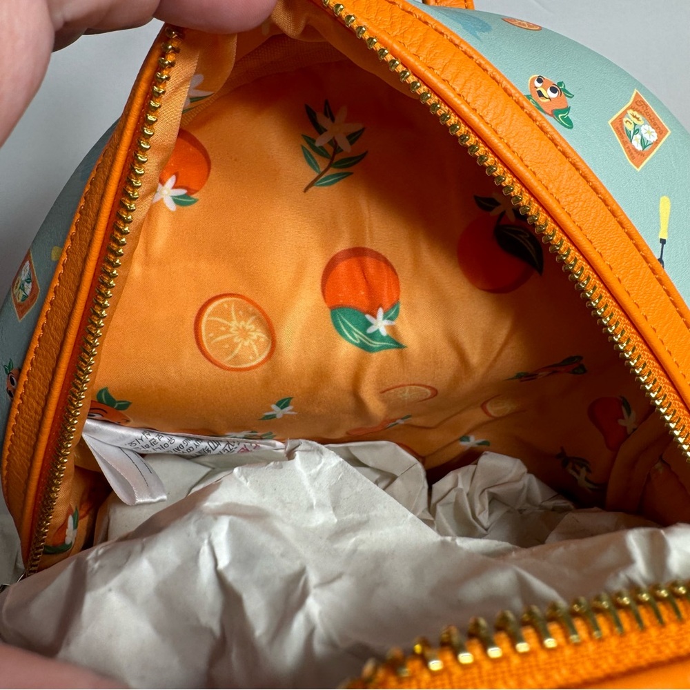 NWT. Disney Loungefly featuring Orange Bird. Approx. 10" H x 9 1/2" W x 5" D - Picture 12 of 14